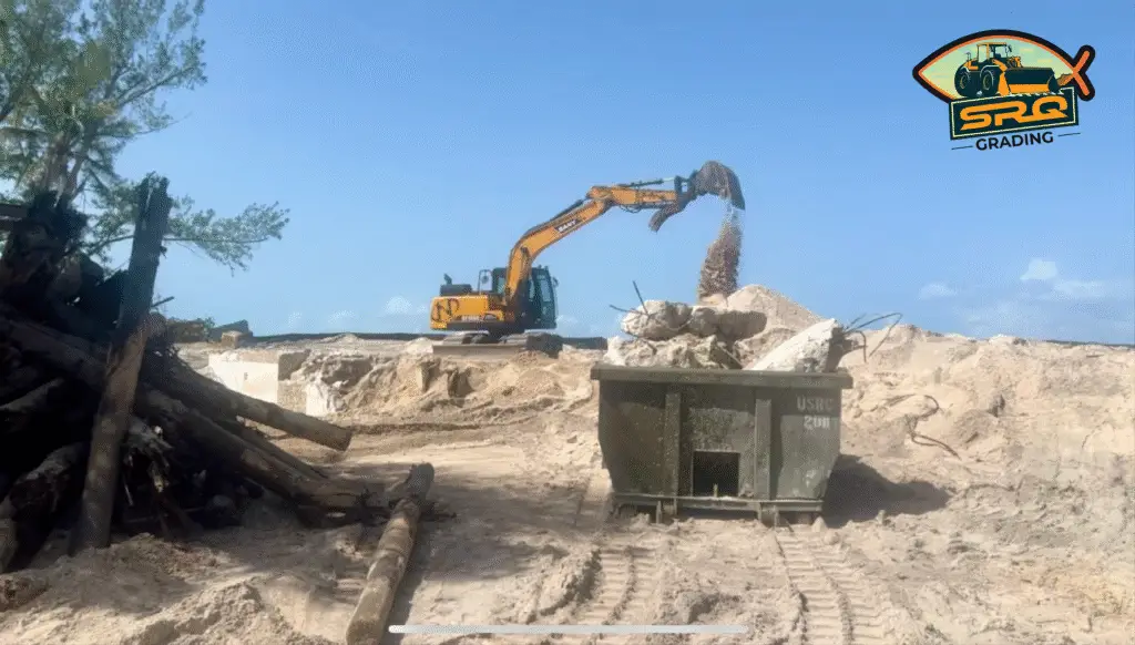 SRQ Grading crew hauling concrete debris from a pool demolition in Manatee County